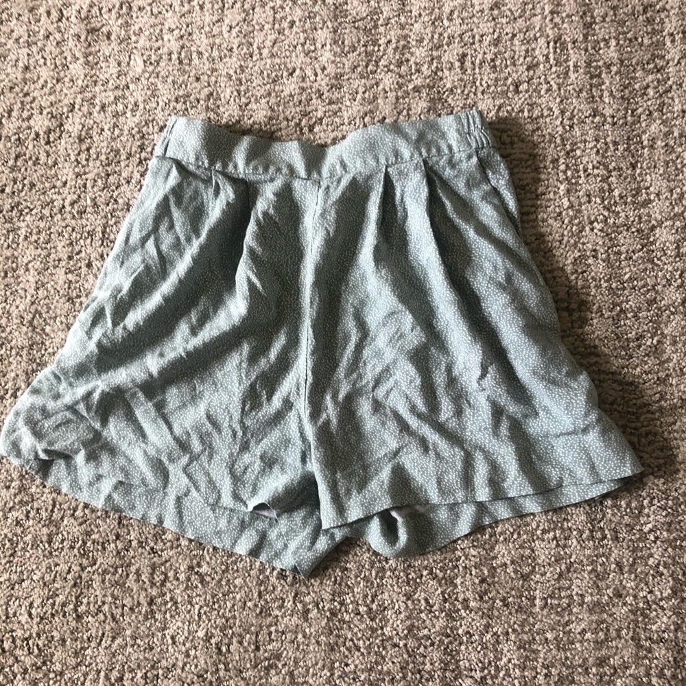 Green and white shorts